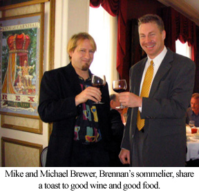 Mike and Michael Brewer, the sommelier, exchange a toast